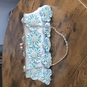 Small light blue clutch